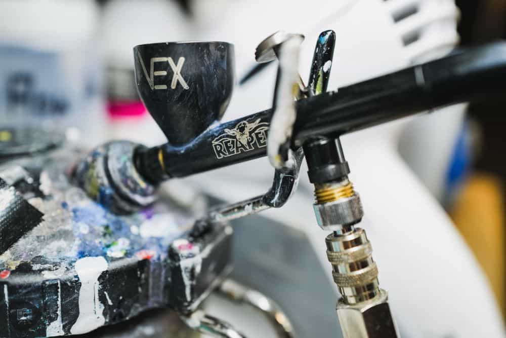 Reaper Vex airbrush review - vex in the airbrush holder side view