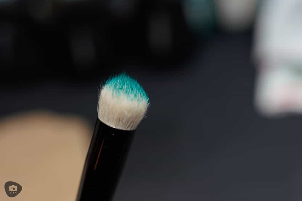 3 ways to use dry brushing on miniatures - loaded dry brush with green teal paint pigments
