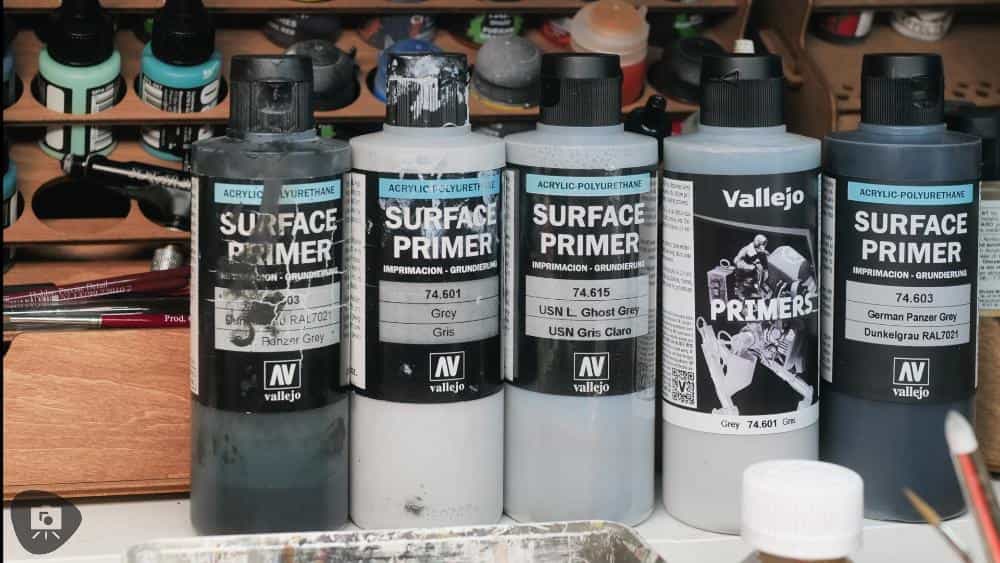 Speed Painting Board Game Miniatures: A Step-by-Step Guide - side by side bottles of Vallejo Surface Primer