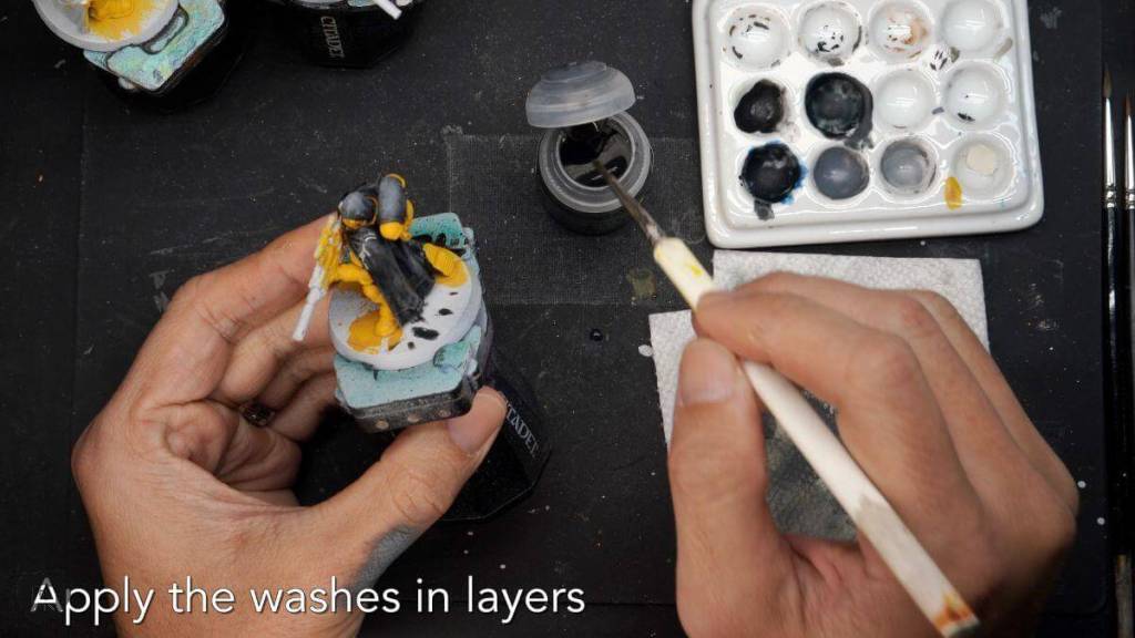How to paint black on miniatures - tips steps - steps to apply shade and wash over the off black base coat