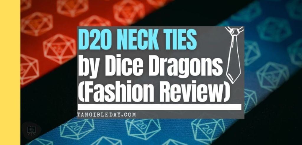 Promotional banner for D20 Neck Ties by Dice Dragons featuring a partial view of two neck ties with 20-sided dice patterns in red and blue, with the text 'D20 Neck Ties by Dice Dragons (Fashion Review)' overlaying the image on a translucent teal background