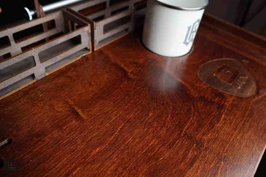 Frontier Wargaming The Hobby Deck Review - portable hobby workstation - close up of the organic wood grain on the deck surface
