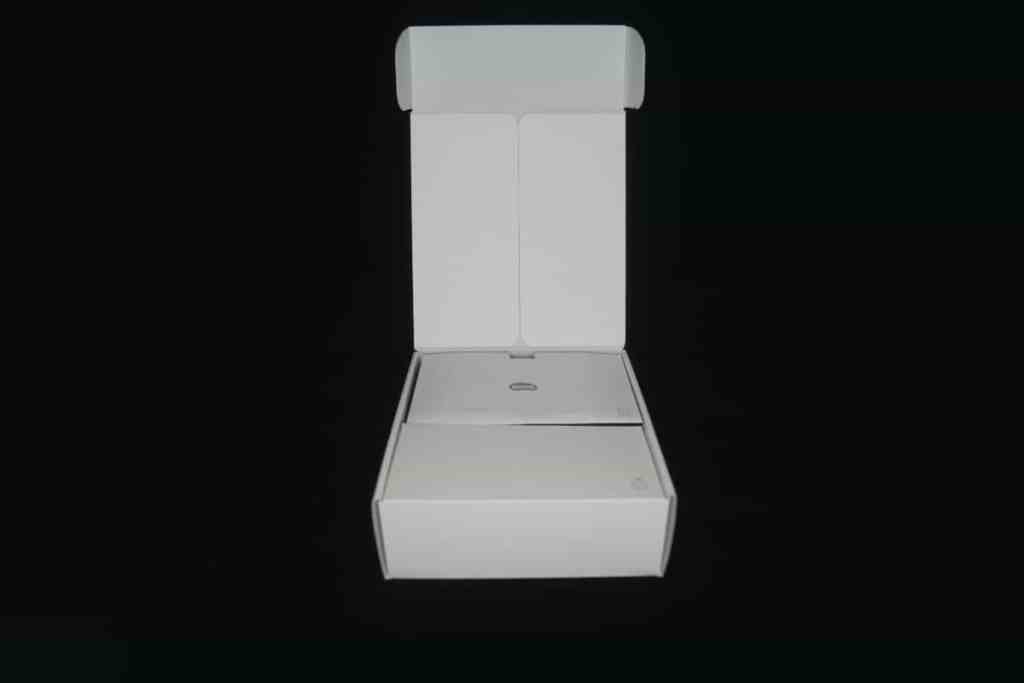 Open empty box of BenQ IdeaCam on a dark background